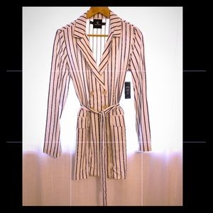 Light weight blazer with belt.